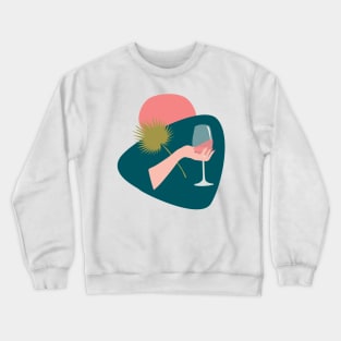 Hand with a glass of rose wine and leaf Crewneck Sweatshirt